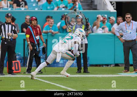 Miami Dolphins safety Verone McKinley III (32) runs back to the sidelines  after intercepting a pass from Houston Texans quarterback Kyle Allen (not  shown) during an NFL football game between the Houston