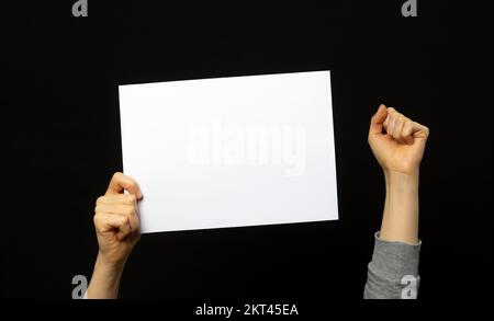 A sheet of white paper is held by a protester in China. Stock Photo