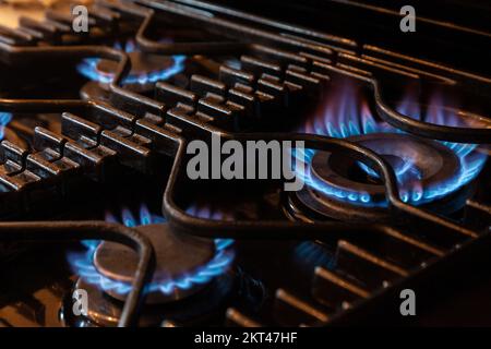 Close-Up Of Gas Stove Burner flames Stock Photo