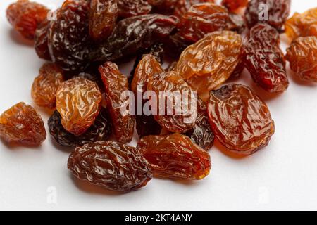 dried sultanas on a white background Stock Photo
