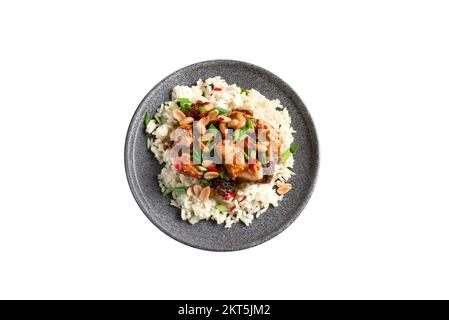 Kung Pao chicken. Isolate. Gong Bao Ji Ding on a white concrete background. Sichuan kung pao is a Chinese dish with chicken meat, chili peppers Stock Photo