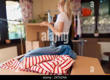 Pre owned clothes resale or donation. Stock Photo