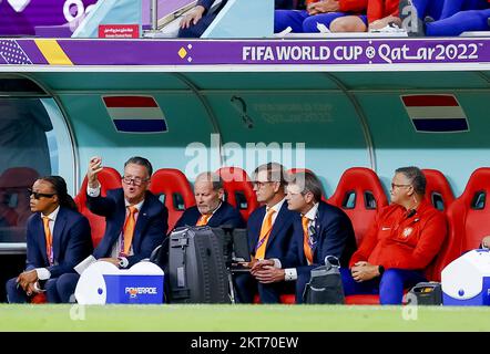 AL KHOR - Holland assistant trainer Edgar Davids, Holland coach Louis van Gaal and Holland assistant trainer Danny Blind (LR) during the FIFA World Cup Qatar 2022 group A match between Netherlands and Qatar at Al Bayt Stadium on November 29, 2022 in Al Khor, Qatar. ANP KOEN VAN WEEL Stock Photo