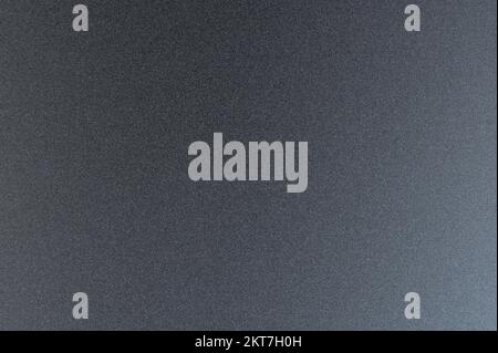 Grainy dark metal surface macro close up view Stock Photo