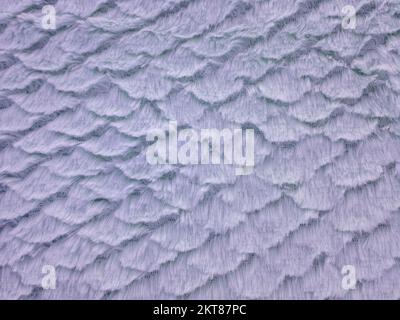Close-up of purple faux fur with scallop pattern Stock Photo