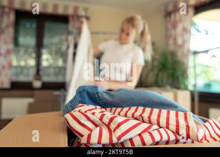 Pre owned clothes resale or donation. Stock Photo