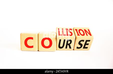 Collision course symbol. Concept word Collision course on wooden cubes. Beautiful white table white background. Business collision course concept. Cop Stock Photo