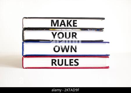 Make your own rules symbol. Concept words Make your own rules on books. Beautiful white table white background. Business motivational make your own ru Stock Photo