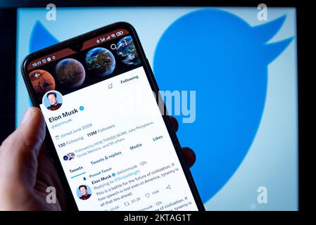 Spain. 29th Nov, 2022. In this photo illustration, Billionaire entrepreneur Elon Musk's Twitter page seen displayed on a smartphone and the Twitter logo in the background. (Credit Image: © Davide Bonaldo/SOPA Images via ZUMA Press Wire) Stock Photo