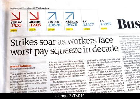 'Strikes soar as workers face worst pay squeeze in decade' Guardian newspaper headline clipping 16 November 2022 London UK Great Britain Stock Photo