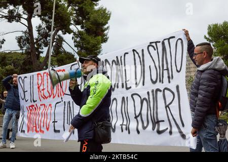 Palermo, Sicily, Italy. 29th Nov, 2022. Hundreds of people demonstrated with the slogan ''Immediate work or the Income cannot be touched'' from the center of Palermo to Palazzo Orleans, seat of the Presidency of the Sicilian Region.The citizens' income is a social welfare system created in Italy in January 2019. The new italian government of Giorgia Meloni intends to abolish it. (Credit Image: © Victoria Herranz/ZUMA Press Wire) Stock Photo