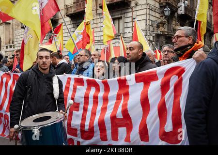 Palermo, Sicily, Italy. 29th Nov, 2022. Hundreds of people demonstrated with the slogan ''Immediate work or the Income cannot be touched'' from the center of Palermo to Palazzo Orleans, seat of the Presidency of the Sicilian Region.The citizens' income is a social welfare system created in Italy in January 2019. The new italian government of Giorgia Meloni intends to abolish it. (Credit Image: © Victoria Herranz/ZUMA Press Wire) Stock Photo