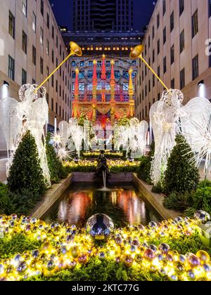 Rockefeller Center with Saals Fifth Avenue Light Show,  and Angels, Manhatten,New York City, New York,USA Stock Photo