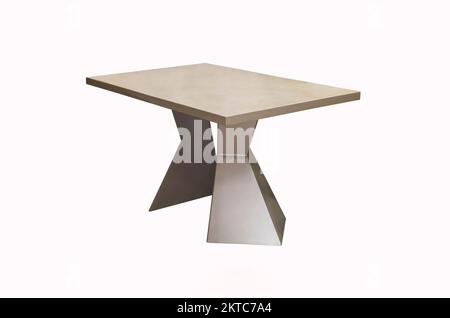 Mod silver table with trapezoidal legs on a white background. Interior Stock Photo