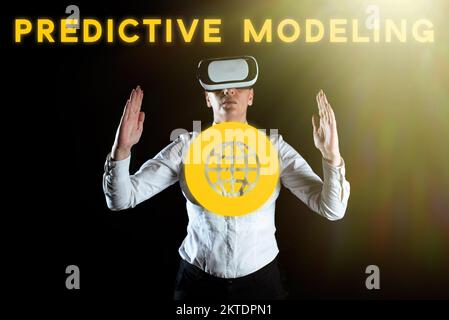 Hand writing sign Predictive Modeling, Word for maintenance strategy driven by predictive analytics Stock Photo