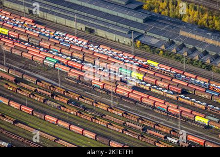 Aerial view, freight cars loaded with passenger cars, at Herne Wanne-Eickel station, shapes and colors, Wanne, Herne, Ruhr area, North Rhine-Westphali Stock Photo