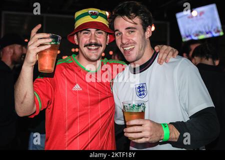 London, UK. 29th Nov, 2022. England and Wales fans watch the England vs Wales World Cup football game at the 4TheFans Fan Park, set up at Dalston Roof Park. Banter and match analysis at the screening is provided by football legend Steve Hodge. Credit: Imageplotter/Alamy Live News Stock Photo