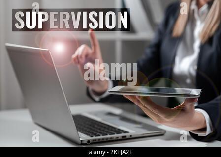 Sign displaying Supervision, Word Written on monitoring and coordinating the plant operations Stock Photo