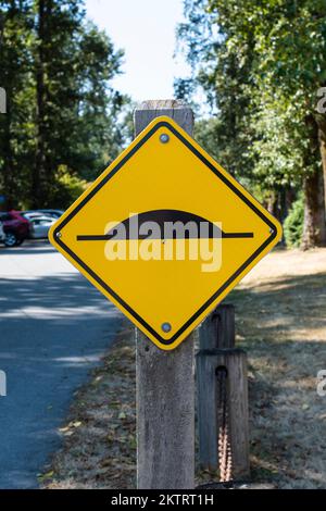 Speed bump sign at Deas Island Regional Parkin Delta, British Columbia, Canada Stock Photo