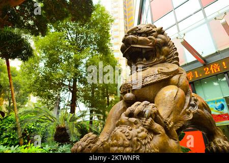 SHENZHEN, CHINA - JAN 06: lion guarding near Bank of China on January 06, 2015. Bank of China Limited is one of the 5 biggest state-owned commercial b Stock Photo