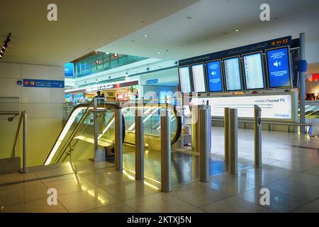 DUBAI, UAE - APRIL 18, 2014: airport interior. Dubai International Airport is a major international airport located in Dubai, and is the world's busie Stock Photo