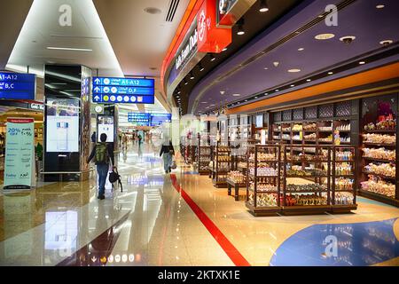 DUBAI, UAE - APRIL 18, 2014: airport interior. Dubai International Airport is a major international airport located in Dubai, and is the world's busie Stock Photo