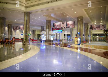 DUBAI, UAE - APRIL 18, 2014: airport interior. Dubai International Airport is a major international airport located in Dubai, and is the world's busie Stock Photo