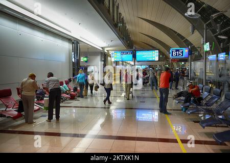 DUBAI, UAE - APRIL 18, 2014: airport interior. Dubai International Airport is a major international airport located in Dubai, and is the world's busie Stock Photo