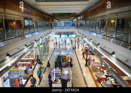 DUBAI, UAE - APRIL 18, 2014: airport interior. Dubai International Airport is a major international airport located in Dubai, and is the world's busie Stock Photo