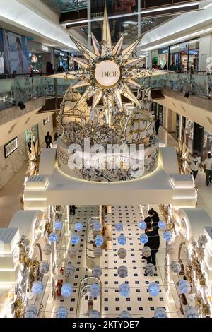 Kuala Lumpur,Malaysia - November 30,2022 : Beautiful Dior Christmas decoration in The Gardens Mall. People can seen exploring and shopping around it. Stock Photo