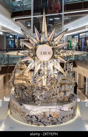 Kuala Lumpur,Malaysia - November 30,2022 : Beautiful Dior Christmas decoration in The Gardens Mall. People can seen exploring and shopping around it. Stock Photo