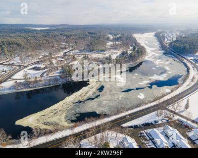 Merrimack River aerial view in winter in town center of Tyngsborough, Massachusetts MA, USA. Stock Photo