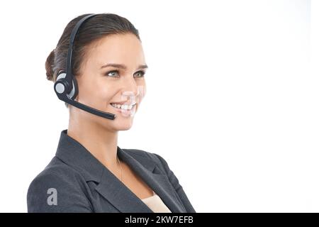 Here to answer any customer question. Studio shot of an attractive customer service representative isolated on white. Stock Photo