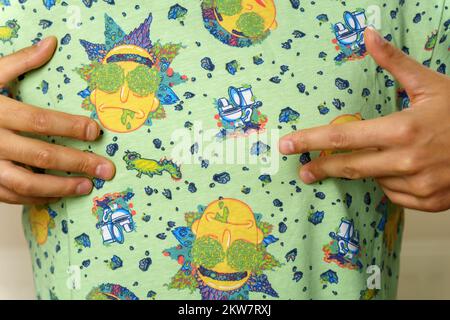 Tyumen, Russia-August 25, 2022: Rick and Morty adult animated science fiction sitcom. Clothing with a logo Stock Photo