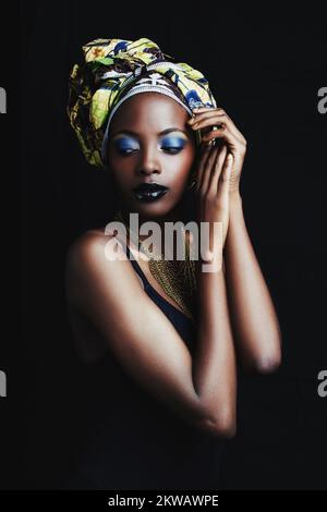Shes a true african beauty. A beautiful african woman posing against a