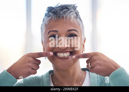 Senior woman, smile and hands for teeth wellness or happy for healthy cleaning care. Elderly person, happiness portrait and dental healthcare or Stock Photo