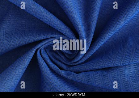 Shaped blue fabric background or design element. Stock Photo