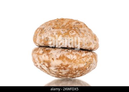 Two sweet tasty gingerbread cookies, macro, isolated on white background. Stock Photo