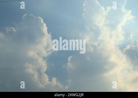 Light blue sky with clouds Stock Photo