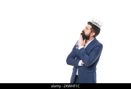 thinking businessman winner with crown isolated on white background. businessman winner Stock Photo
