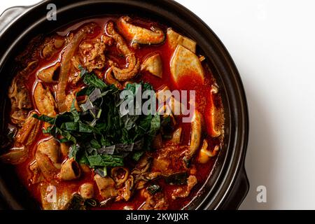 Beef Chitterlings Hotpot on White Background Stock Photo