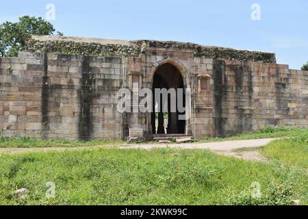 Architectural Archway to Mandvi or Custom House, built in stone and carvings details, was built by Sultan Mahmud Begada 15th - 16th century. A UNESCO Stock Photo