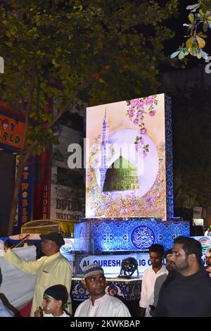 INDIA, MAHARASHTRA, PUNE, October 2022, People during Eid Milad-un-Nabi festival - Green Dome ''Gumbad e Khizra'', decorative backlit flex board, Pune Stock Photo
