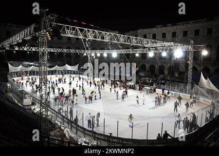 Hockey fans and residents of city Pula ce skate on hockey filed after an end of second day of Arena Ice Fever MMXII in roman amphitheatre on 15. september 2012.  Organizers are ensure 500 skates for everyone who wants ice skate   Photo: Dusko Marusic/PIXSELL  Stock Photo