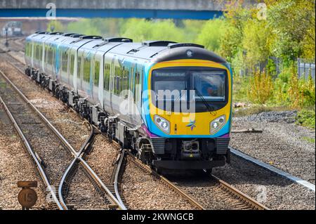 Passenger train in Transpennine Express livery travelling to Redcar, England. Stock Photo