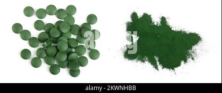 Spirulina algae powder and pills isolated on white background. Top view Stock Photo