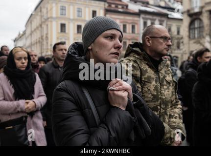 Lviv, Ukraine, Ukraine. 29th Nov, 2022. Oleg Bervetskyi, 39, was killed on November 21, 2022, in combat after a recent visit home for his birthday. His wife, Natalia, and two children said goodbye surrounded by family and friends while air alarms sounded out. He was buried alongside Maksym-Mykhailo Vrubel at Lychakiv cemetery after a service at the Garrison Church of Saints Apostles Peter and Paul in Lviv, Ukraine on November 29, 2022. (Credit Image: © Svet Jacqueline/ZUMA Press Wire) Stock Photo