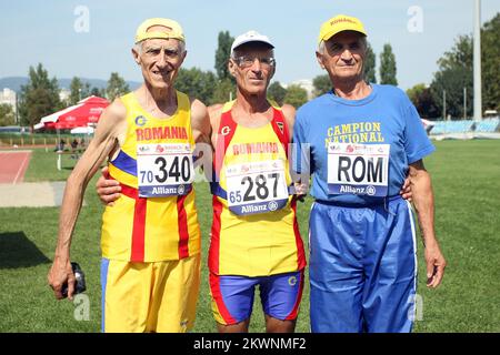 08.08.2013., Zagreb, Croatia - 22nd Balkan Athletics Masters Games, which was first held in Croatia. Games  gathered 717 participants from the 16 countries. Nicolae Sdrula and Zoltan Beno are the oldest participants from Romania aged 70 and 80 years old. Photo: Luka Stanzl/PIXSELL  Stock Photo