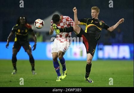 Kevin De Bruyne of Belgium, left Marius Marin of Romania during the ...