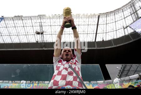 2014 FIFA World Cup group A game against Mexico and Croatia. Croatian fans holds a trophy of World cup Photo: Sanjin Strukic/PIXSELL Stock Photo